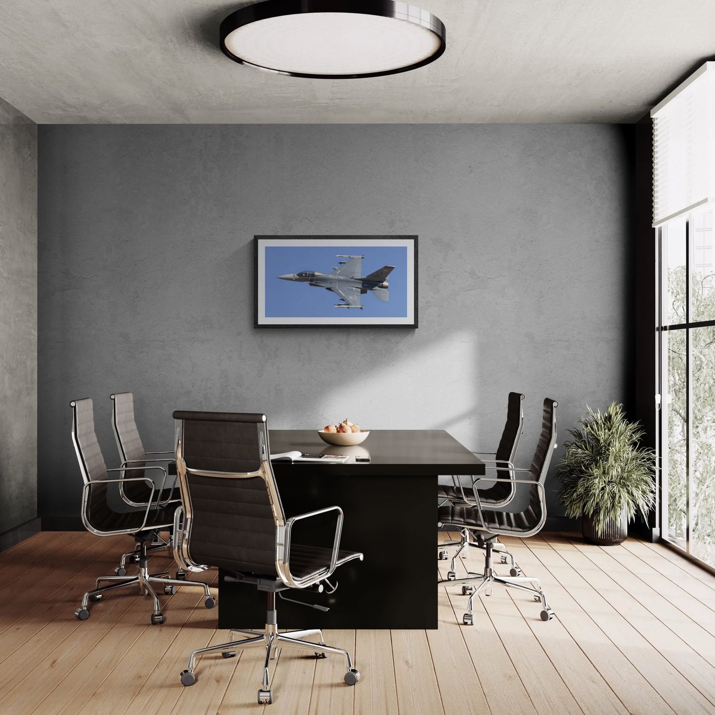 A large-scale 40x28 "Statement Edition" of the "Viper Launch" F-16 print anchored in a professional boardroom. The aviation art is displayed in a textured black frame on a grey concrete feature wall, highlighting its high-fidelity detail and commanding presence in a luxury office environment.