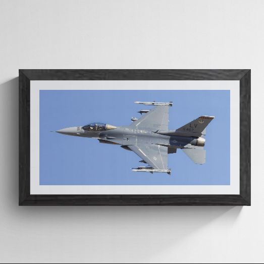 Limited edition F-16 Fighting Falcon photography print titled "Viper Launch" by Phil Schmauder at Nellis AFB. The master print, featuring a high-resolution study of a Viper’s high-energy departure, is professionally presented in a textured black gallery frame with a wide white mat on a clean light grey background.
