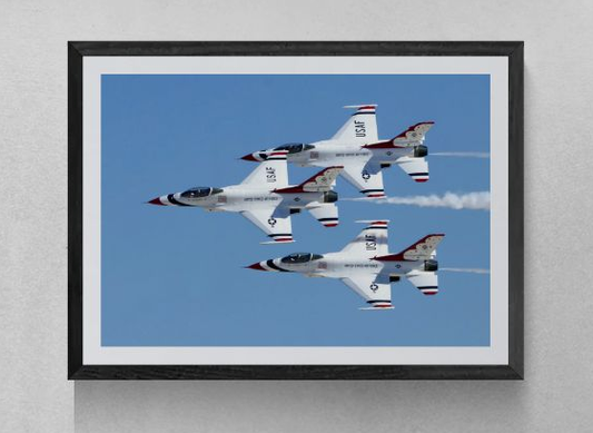 Triad Precision, a limited-edition fine art aviation photograph by Phil Schmauder for PES Editions, featuring a rare three-ship F-16 Fighting Falcon diamond pass in review by the U.S. Air Force Thunderbirds at Nellis AFB during Aviation Nation 2025, framed with a clean white gallery border.
