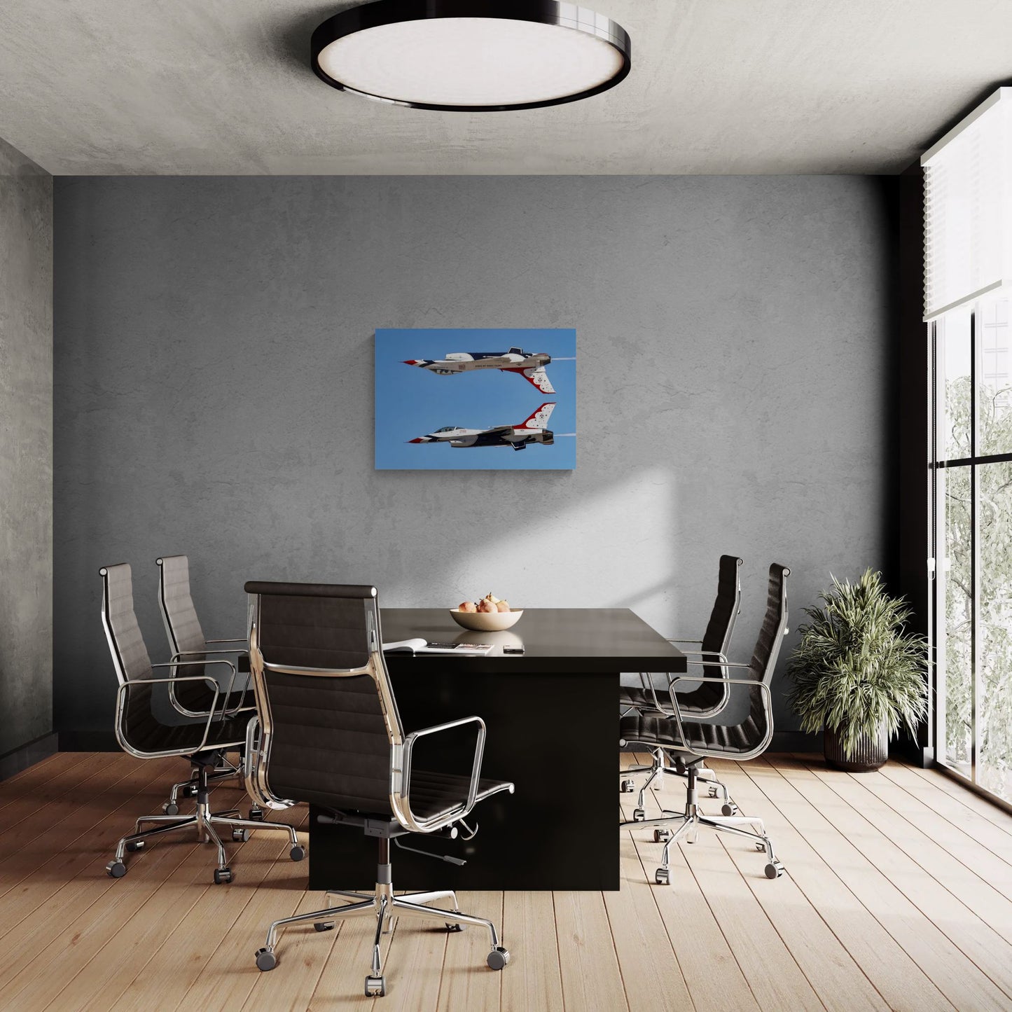 Executive conference room featuring a large-scale Statement Edition metal aviation print of the Thunderbirds Calypso Pass, float-mounted seamlessly on a dark concrete wall above a minimalist boardroom table.