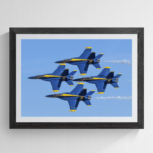 The Blue Diamond four-ship Blue Angels fine art print showcased in a rustic black frame with a crisp white mat.
